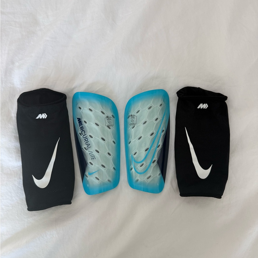 Nike Blue Shin Guards with Black Sleeves